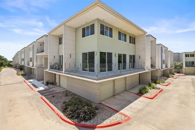 a house with a bench in front of it