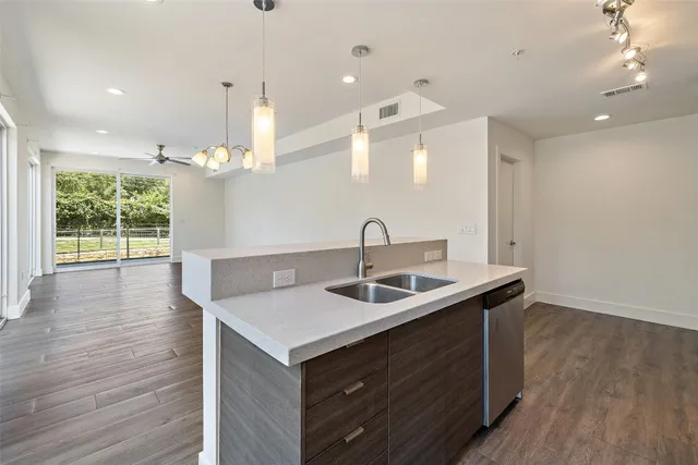 a aerial view of a house with a yard