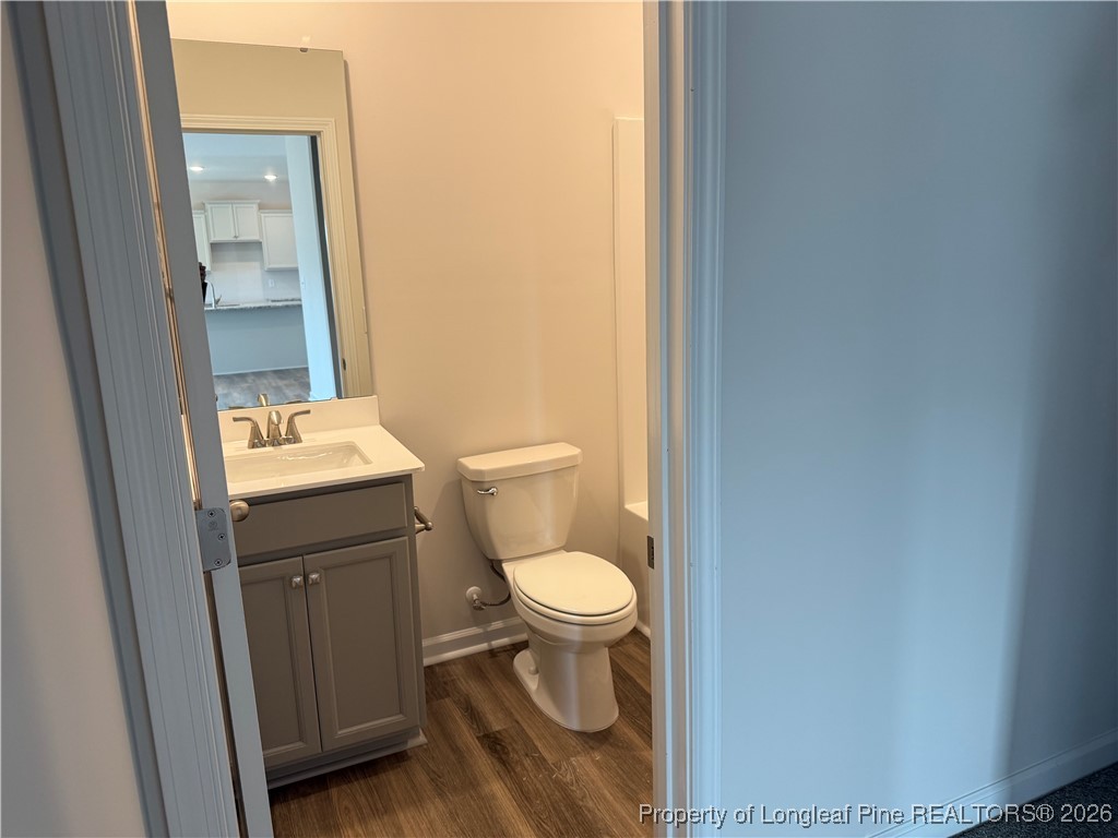 471 Ashley Hts Drive Aberdeen, NC 28315 - Photo 17 of 38 a bathroom with a toilet and a sink