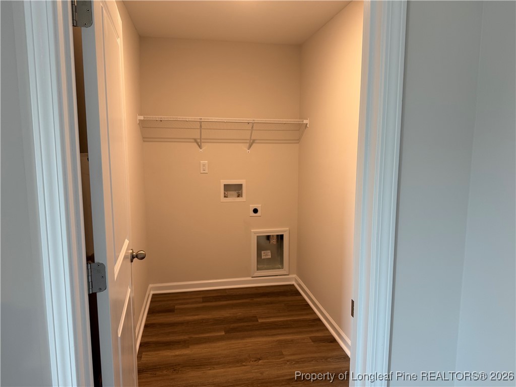 471 Ashley Hts Drive Aberdeen, NC 28315 - Photo 22 of 38 a view of a hallway with wooden floor and entryway
