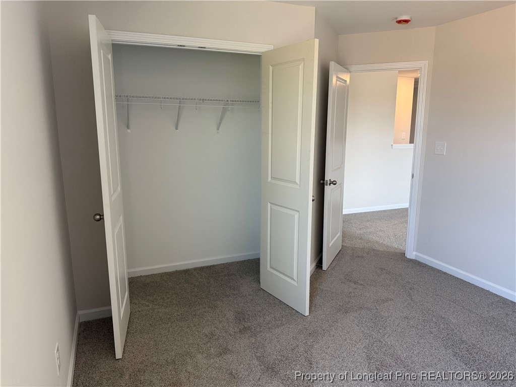 471 Ashley Hts Drive Aberdeen, NC 28315 - Photo 24 of 38 an empty room that has a mirror