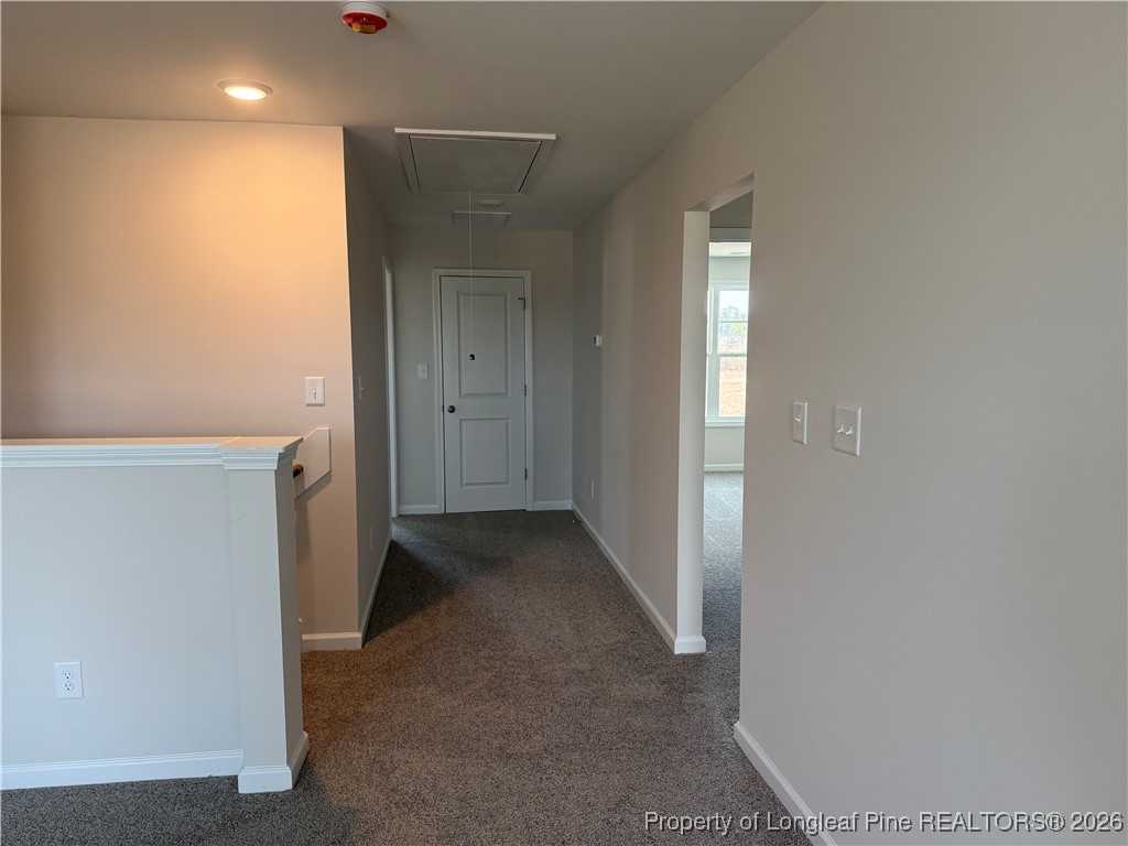 471 Ashley Hts Drive Aberdeen, NC 28315 - Photo 25 of 38 a view of a hallway with an empty space