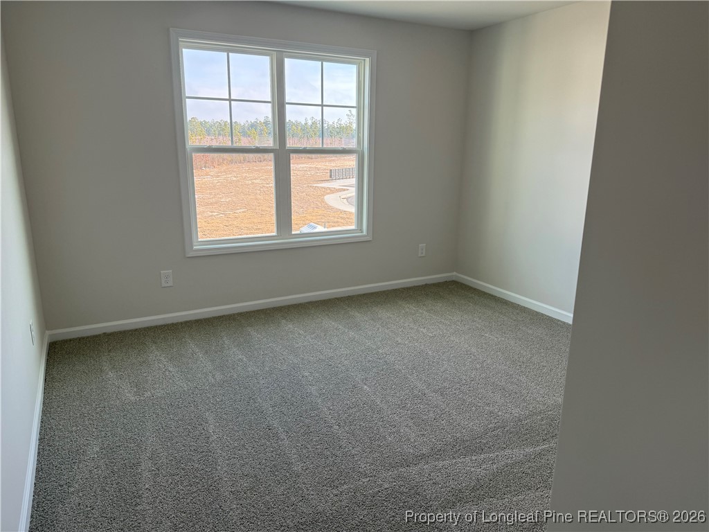 471 Ashley Hts Drive Aberdeen, NC 28315 - Photo 29 of 38 an empty room with a window