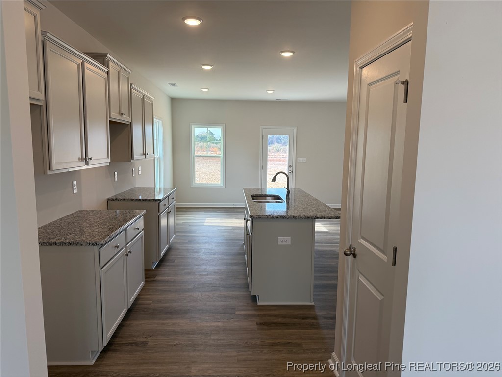 471 Ashley Hts Drive Aberdeen, NC 28315 - Photo 6 of 38 a kitchen with sink and cabinets
