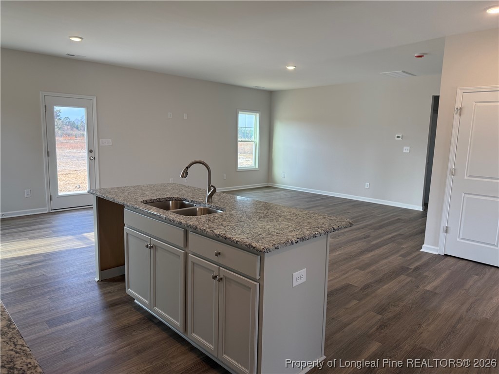 471 Ashley Hts Drive Aberdeen, NC 28315 - Photo 8 of 38 a kitchen with sink and cabinets