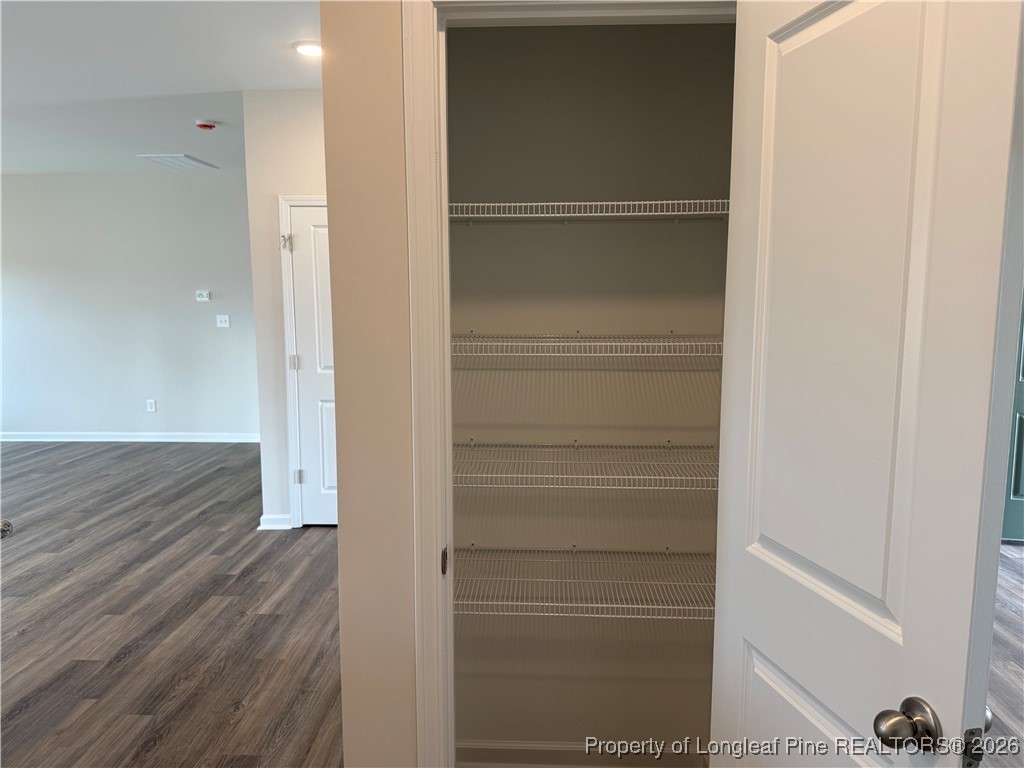 471 Ashley Hts Drive Aberdeen, NC 28315 - Photo 10 of 38 a view of walk in closet with empty racks