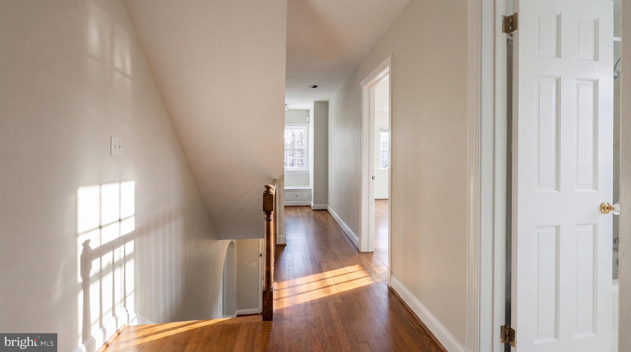 3640 Brandywine Street Northwest Washington, DC 20008 - Photo 14 of 39 a view of a hallway with wooden floor and stairs