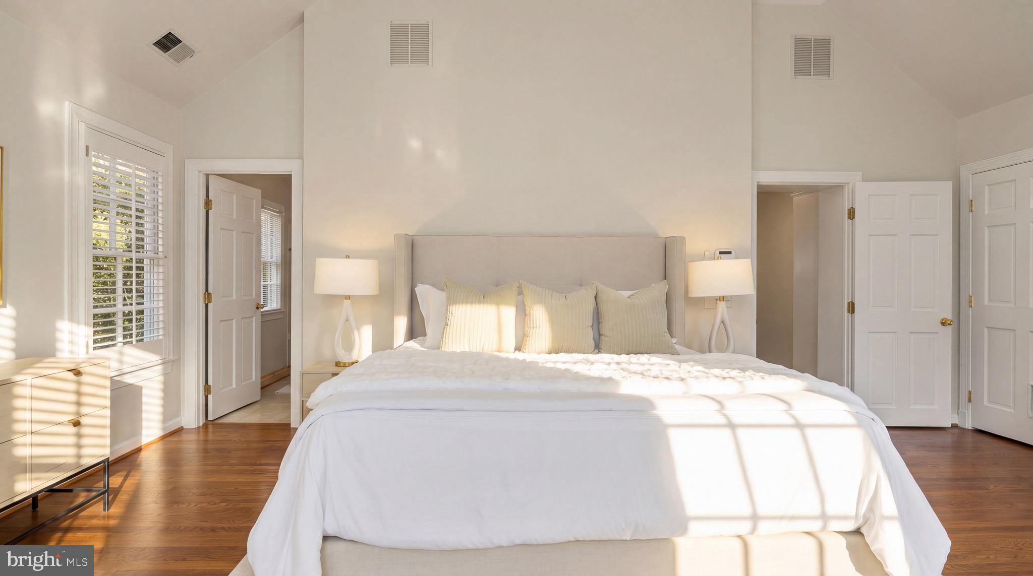 3640 Brandywine Street Northwest Washington, DC 20008 - Photo 18 of 39 a bedroom with a bed and a wooden floor