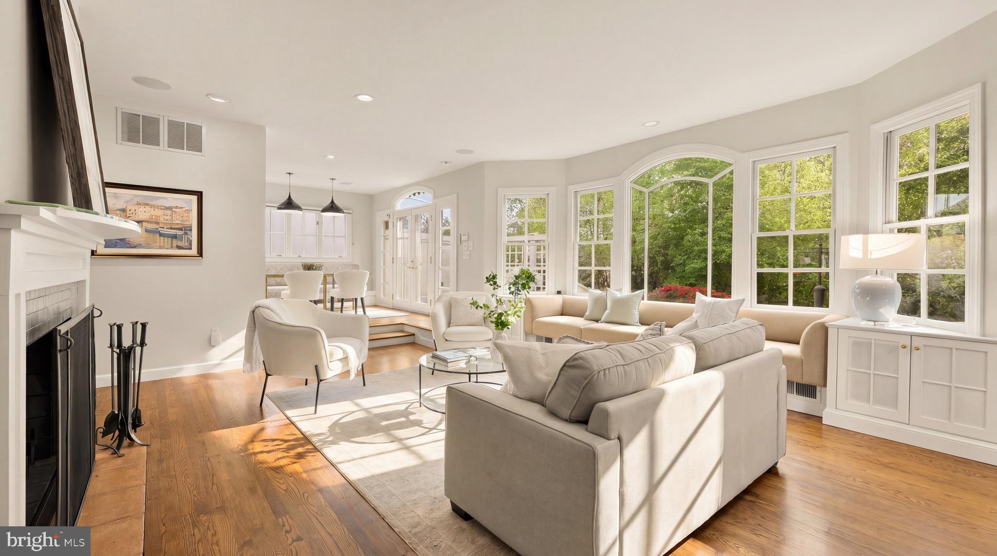 3640 Brandywine Street Northwest Washington, DC 20008 - Photo 2 of 39 a living room with fireplace furniture and a large window