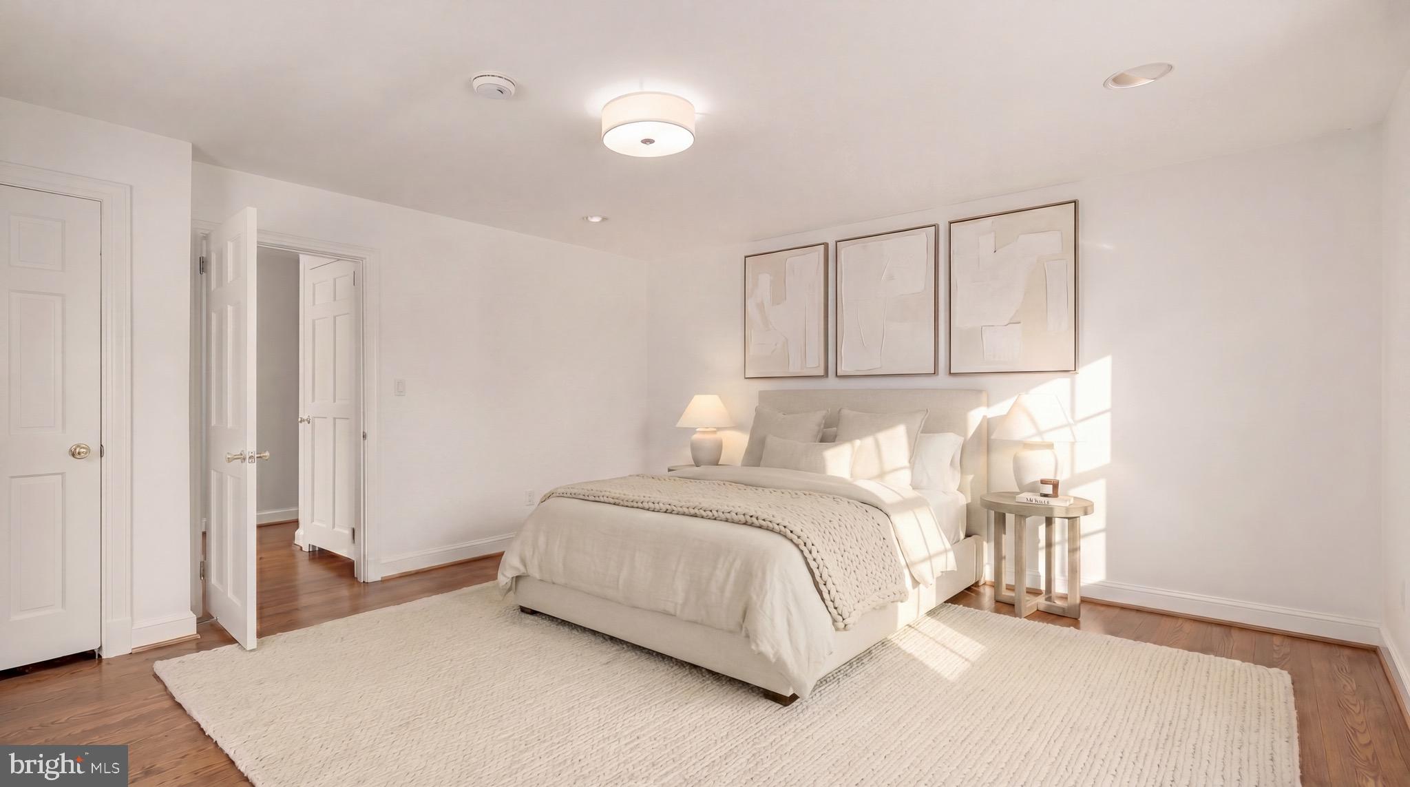3640 Brandywine Street Northwest Washington, DC 20008 - Photo 25 of 39 a bedroom with a bed and a cabinets
