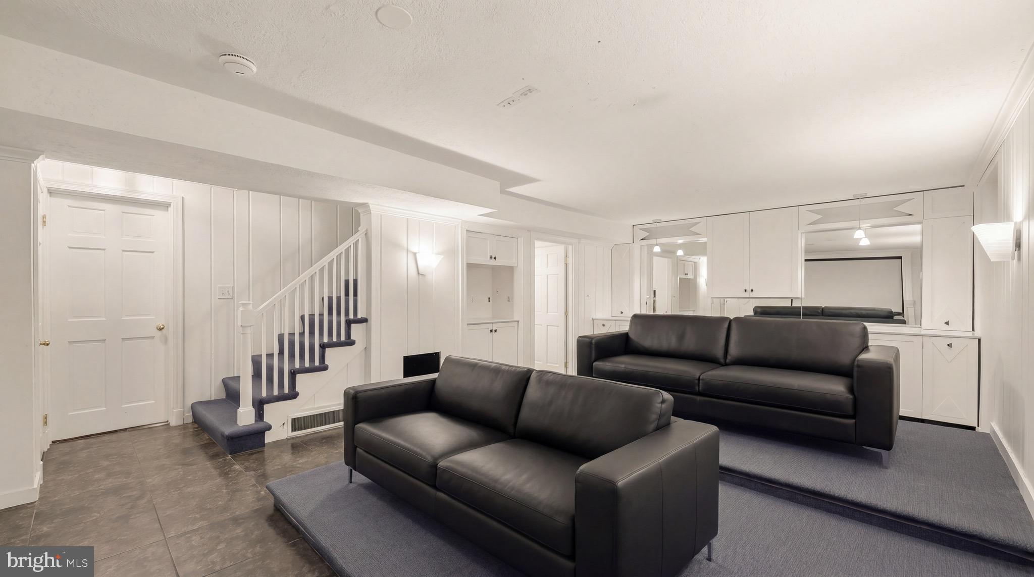 3640 Brandywine Street Northwest Washington, DC 20008 - Photo 30 of 39 a living room with furniture and a ceiling fan