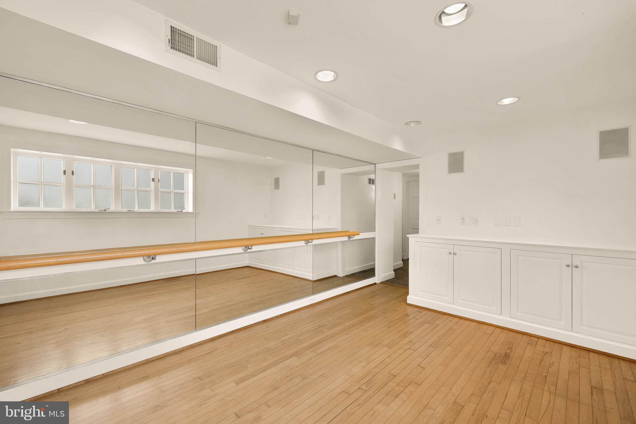 3640 Brandywine Street Northwest Washington, DC 20008 - Photo 32 of 39 a view of an empty room with wooden floor