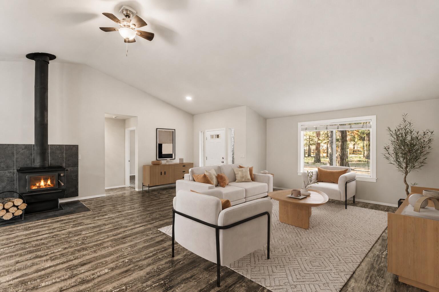 16050 Dick Road La Pine, OR 97739 - Photo 6 of 59 a living room with furniture and a fireplace