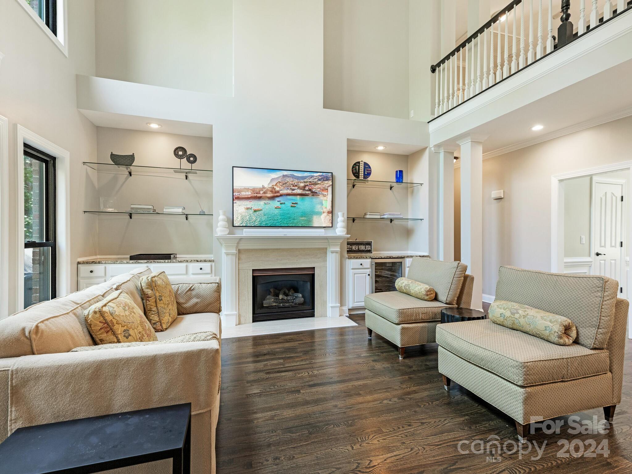 3234 Planters Ridge Road Charlotte, NC 28270 - Photo 11 of 33 a living room with furniture and a fireplace