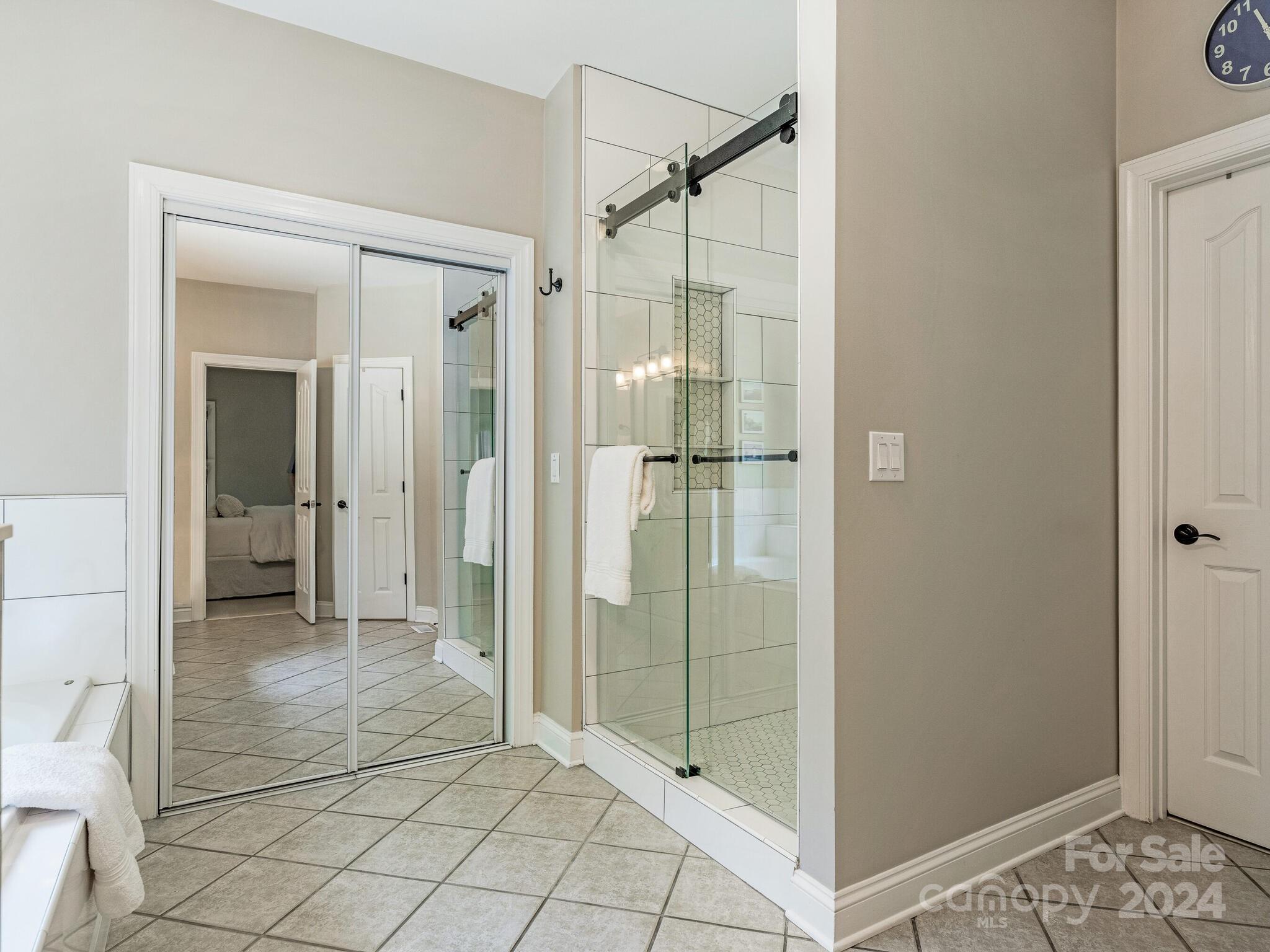 3234 Planters Ridge Road Charlotte, NC 28270 - Photo 16 of 33 a bathroom with a shower and a sink