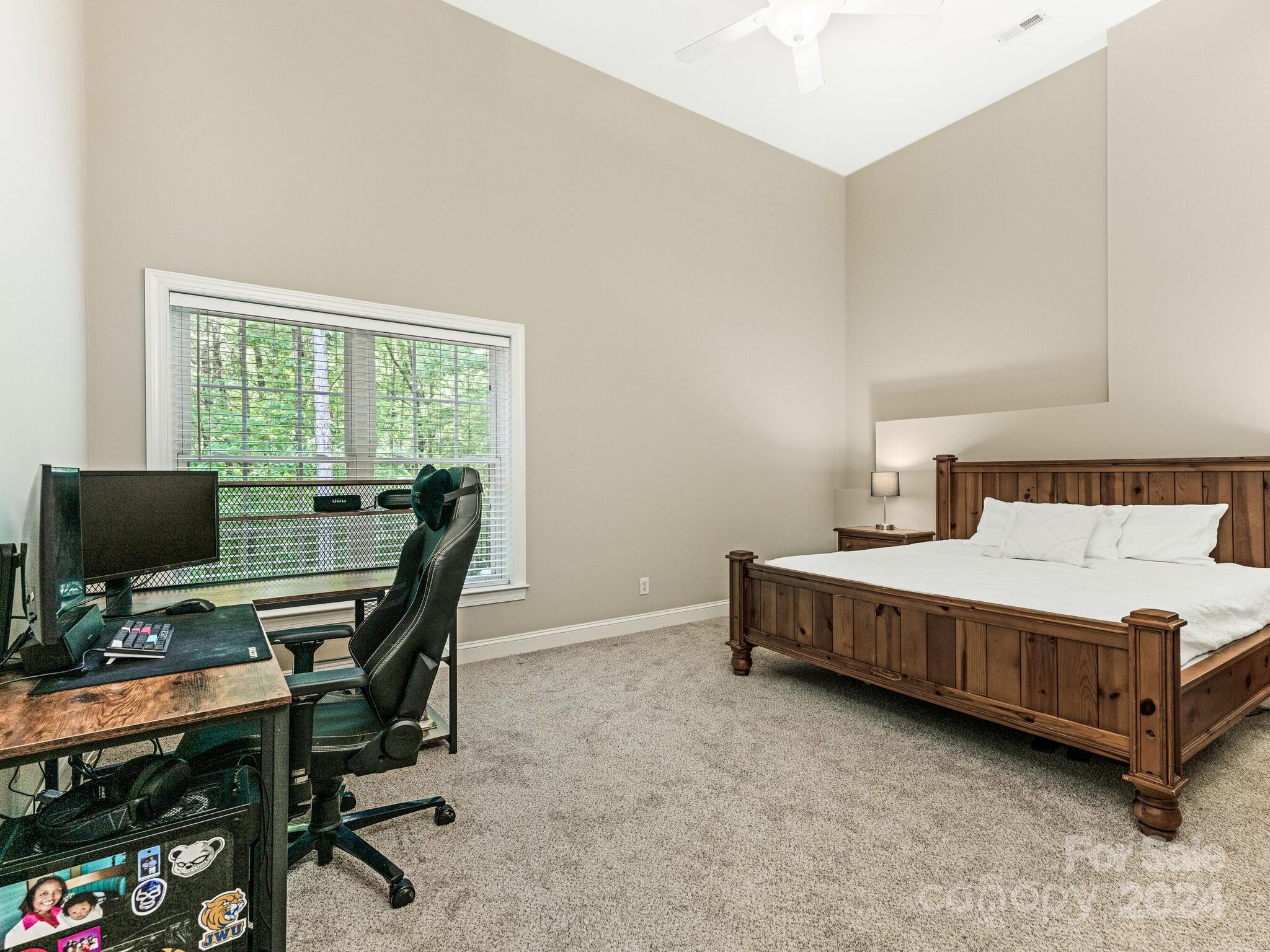 3234 Planters Ridge Road Charlotte, NC 28270 - Photo 29 of 33 a bedroom with a bed and a desk