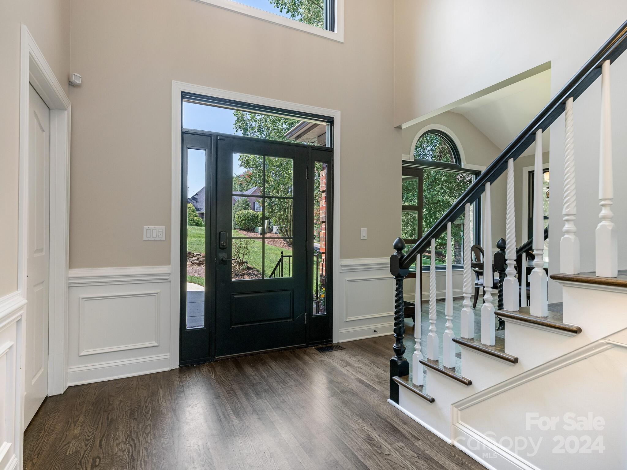 3234 Planters Ridge Road Charlotte, NC 28270 - Photo 3 of 33 a view of entryway with wooden floor and stairs