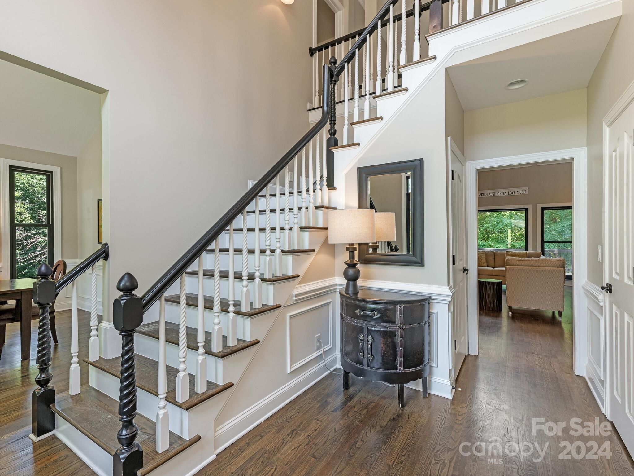 3234 Planters Ridge Road Charlotte, NC 28270 - Photo 4 of 33 a view of entryway kitchen and hall with wooden floor