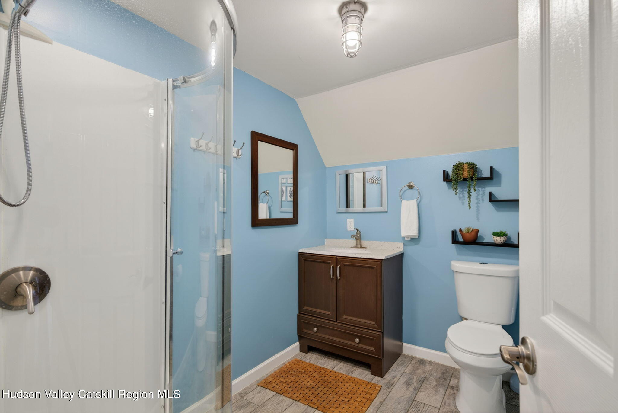 322 Morrison Road Acra, NY 12405 - Photo 41 of 49 a bathroom with a toilet a sink and shower curtain