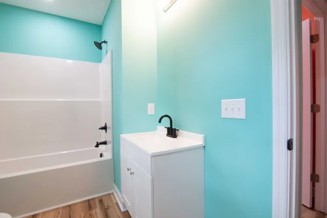 a bathroom with a sink and a bathtub