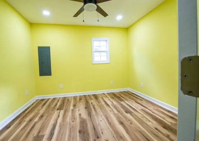 a view of a big room with wooden floor