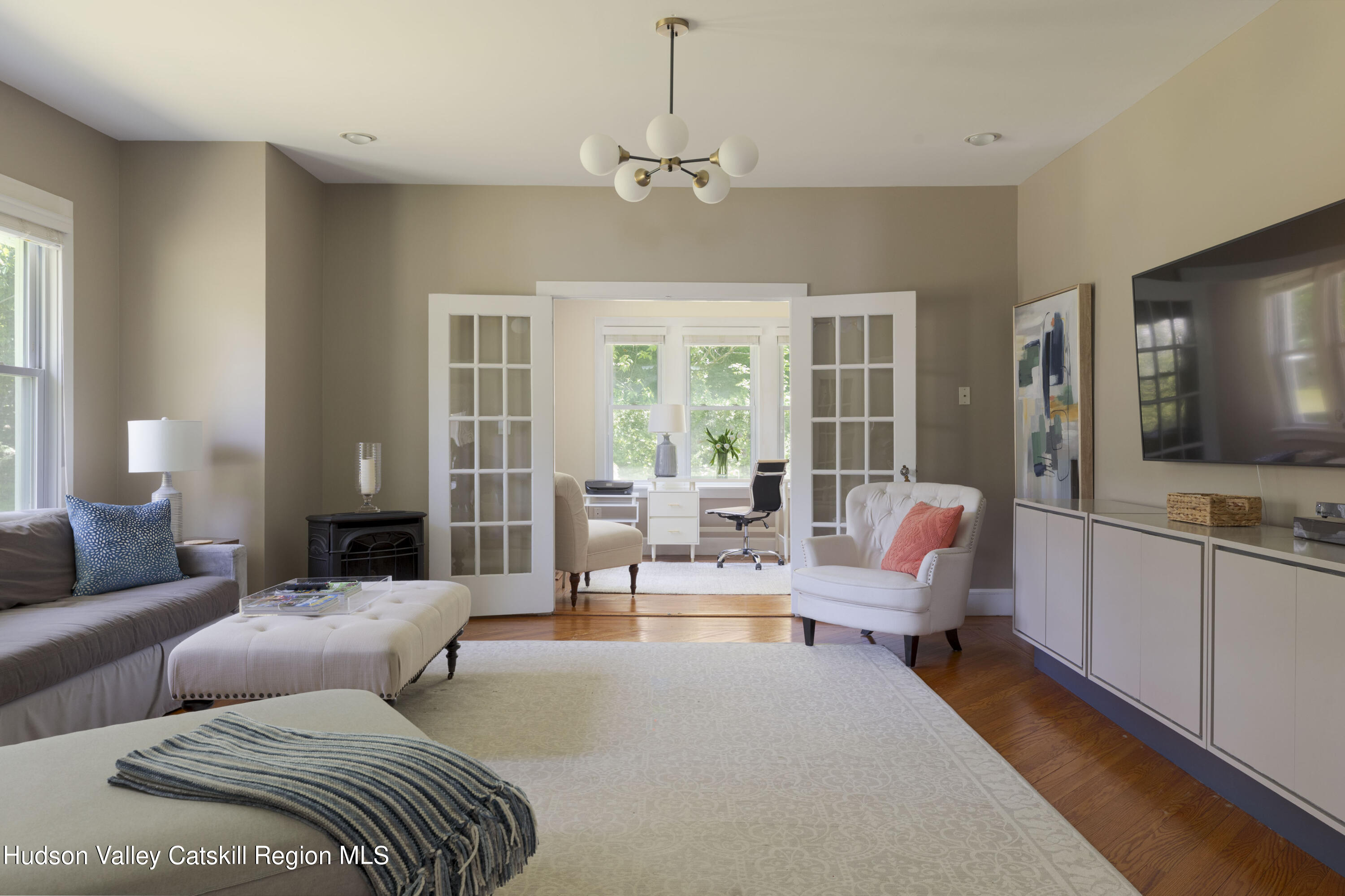 12 Church Hill Road Rifton, NY 12471 - Photo 14 of 33 a living room with furniture and a flat screen tv