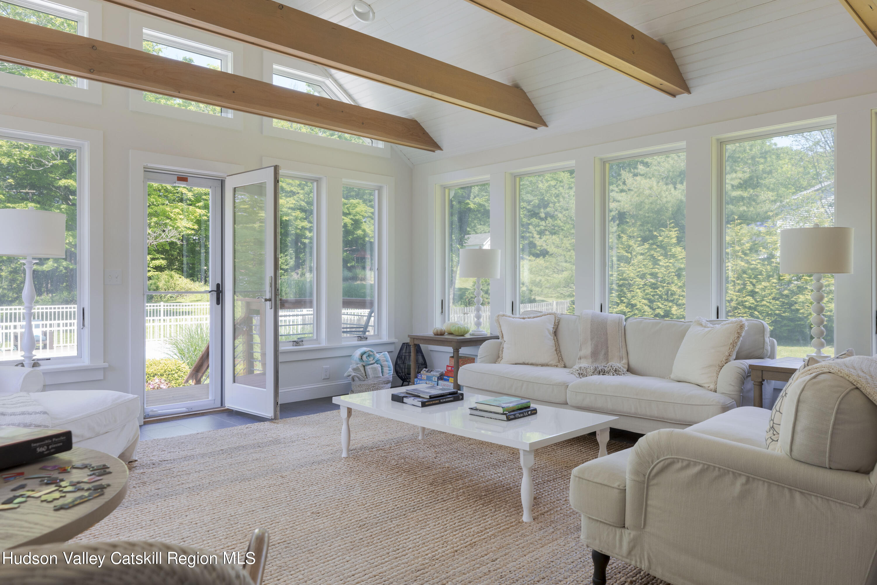 12 Church Hill Road Rifton, NY 12471 - Photo 16 of 33 a living room with furniture and large windows