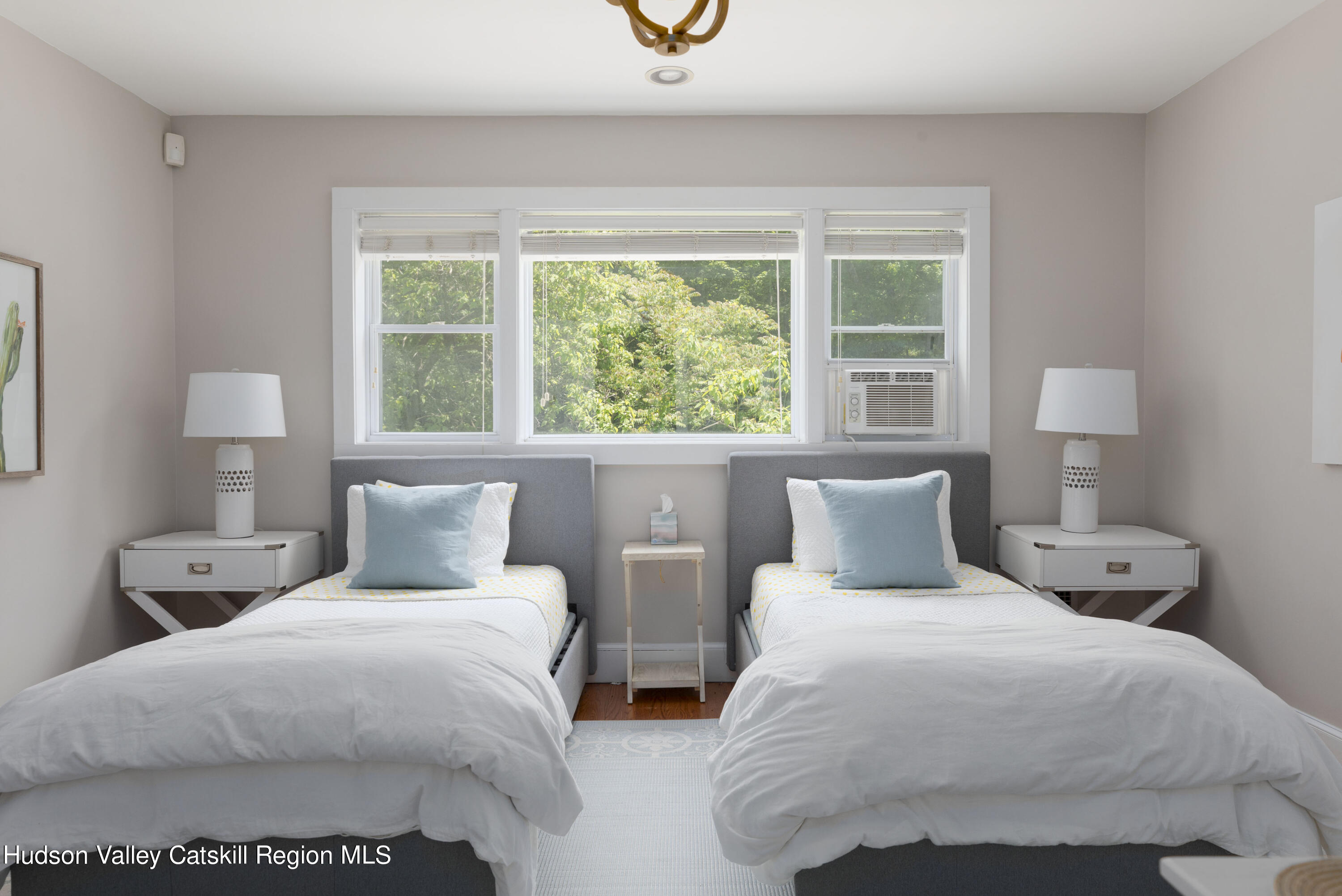 12 Church Hill Road Rifton, NY 12471 - Photo 21 of 33 a bedroom with two beds and a large window