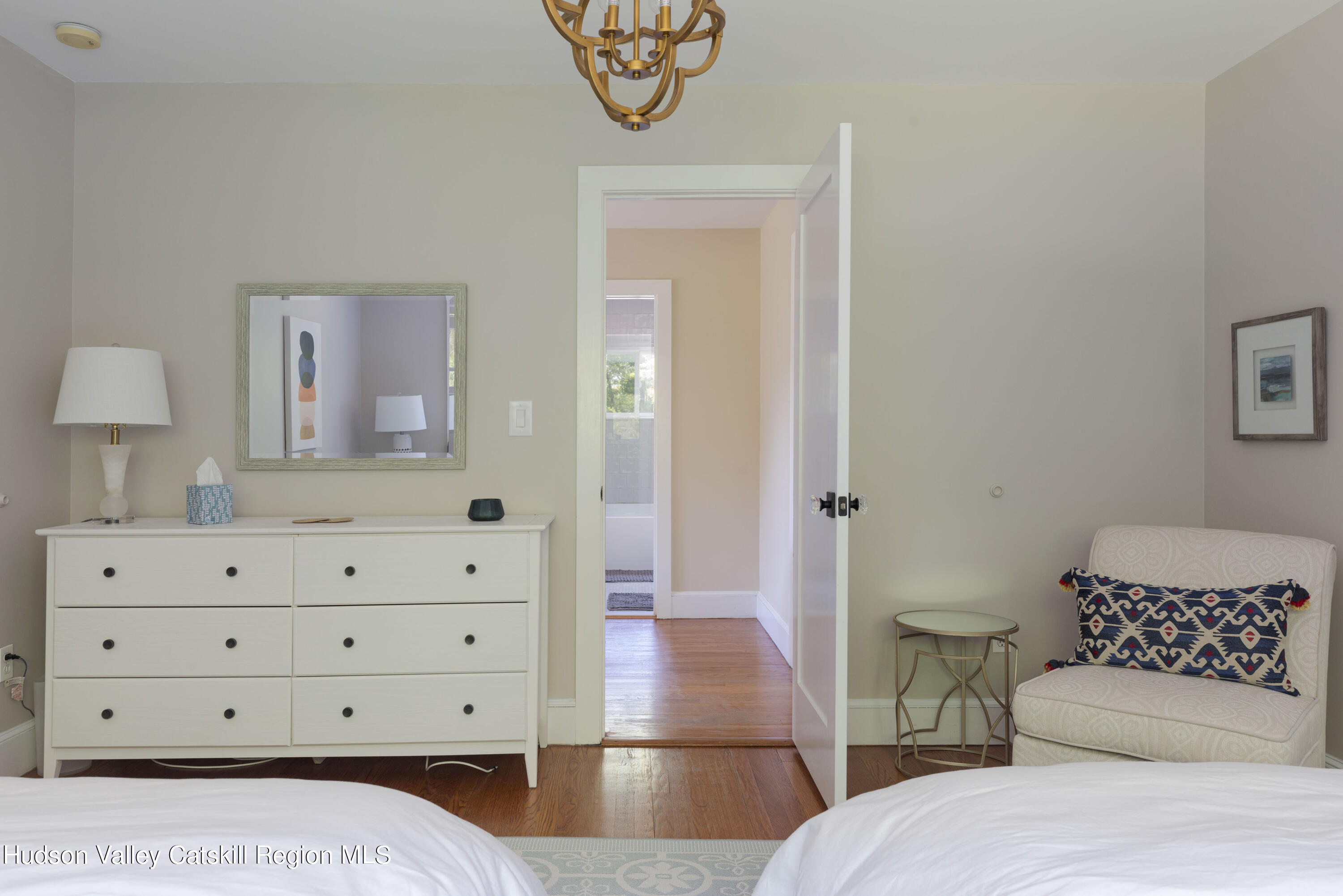 12 Church Hill Road Rifton, NY 12471 - Photo 22 of 33 a bedroom with a bed and a dresser in it