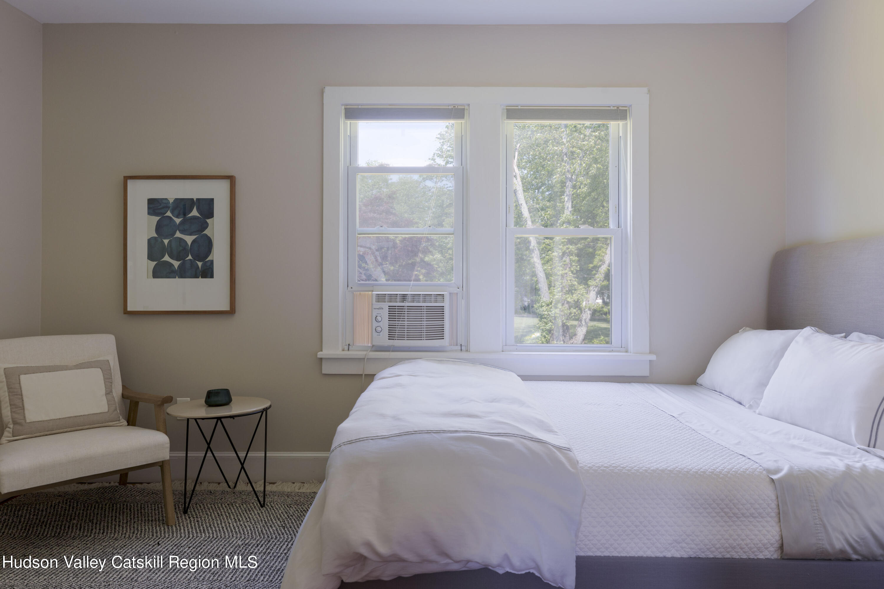 12 Church Hill Road Rifton, NY 12471 - Photo 25 of 33 a bedroom with a bed a couch and a window