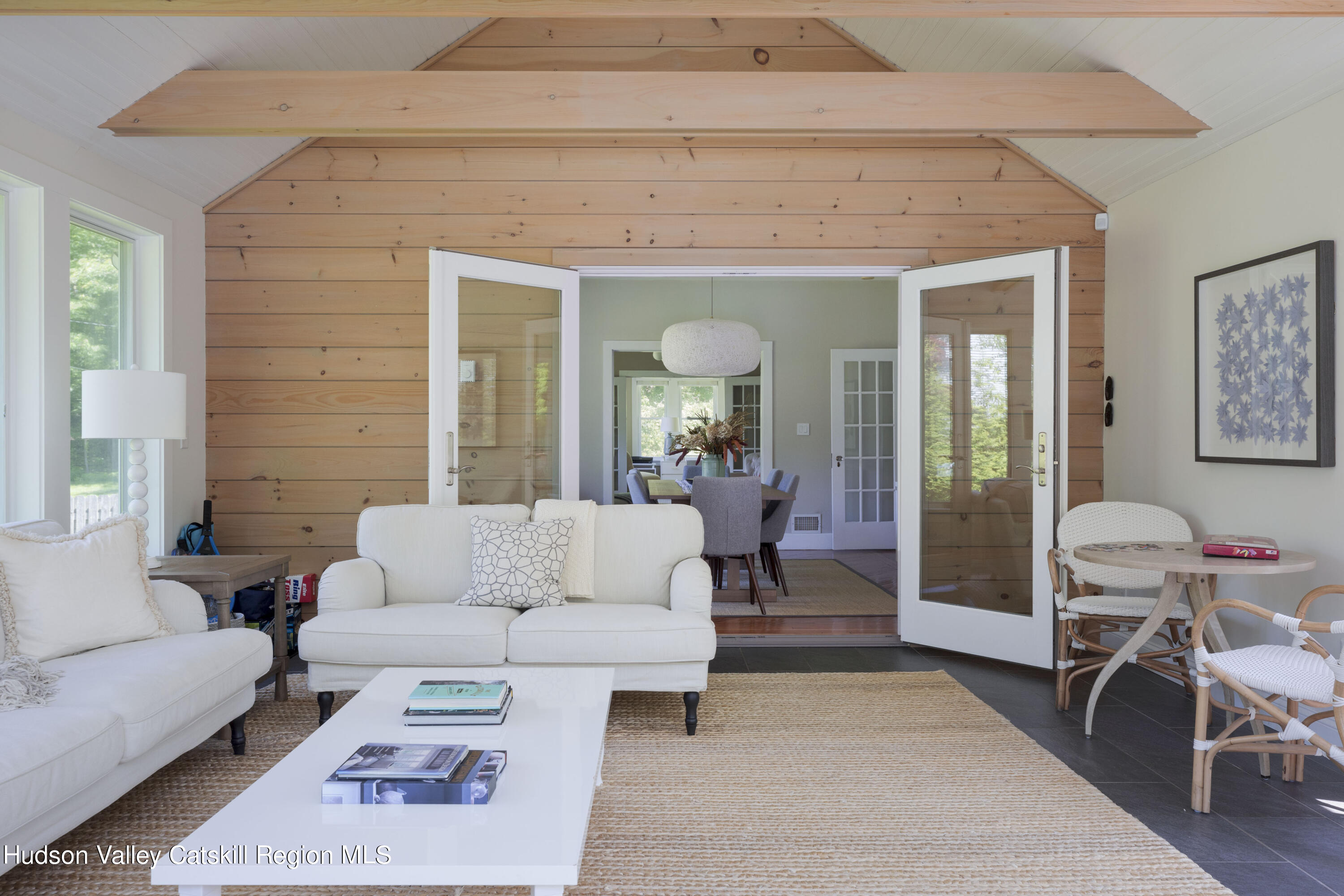 12 Church Hill Road Rifton, NY 12471 - Photo 27 of 33 a living room with furniture a rug and a mirror