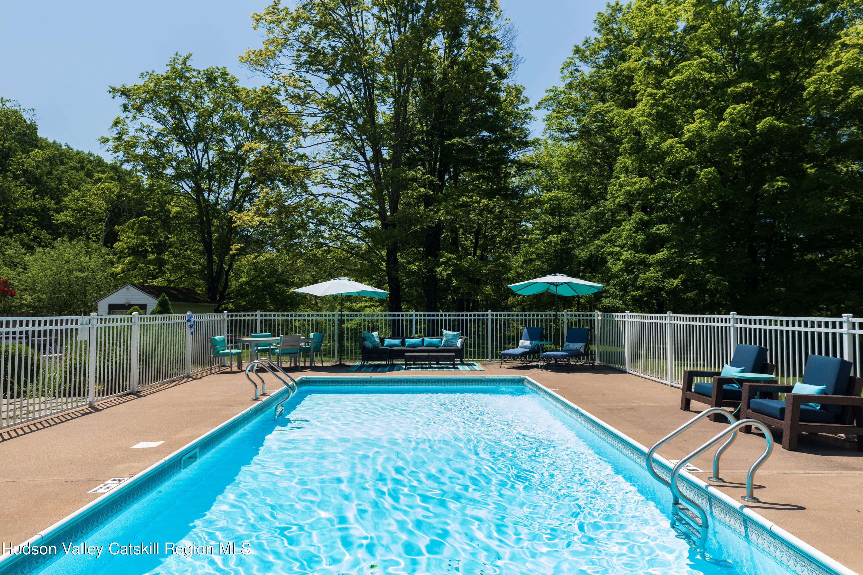12 Church Hill Road Rifton, NY 12471 - Photo 3 of 33 a house view with a swimming pool and sitting space