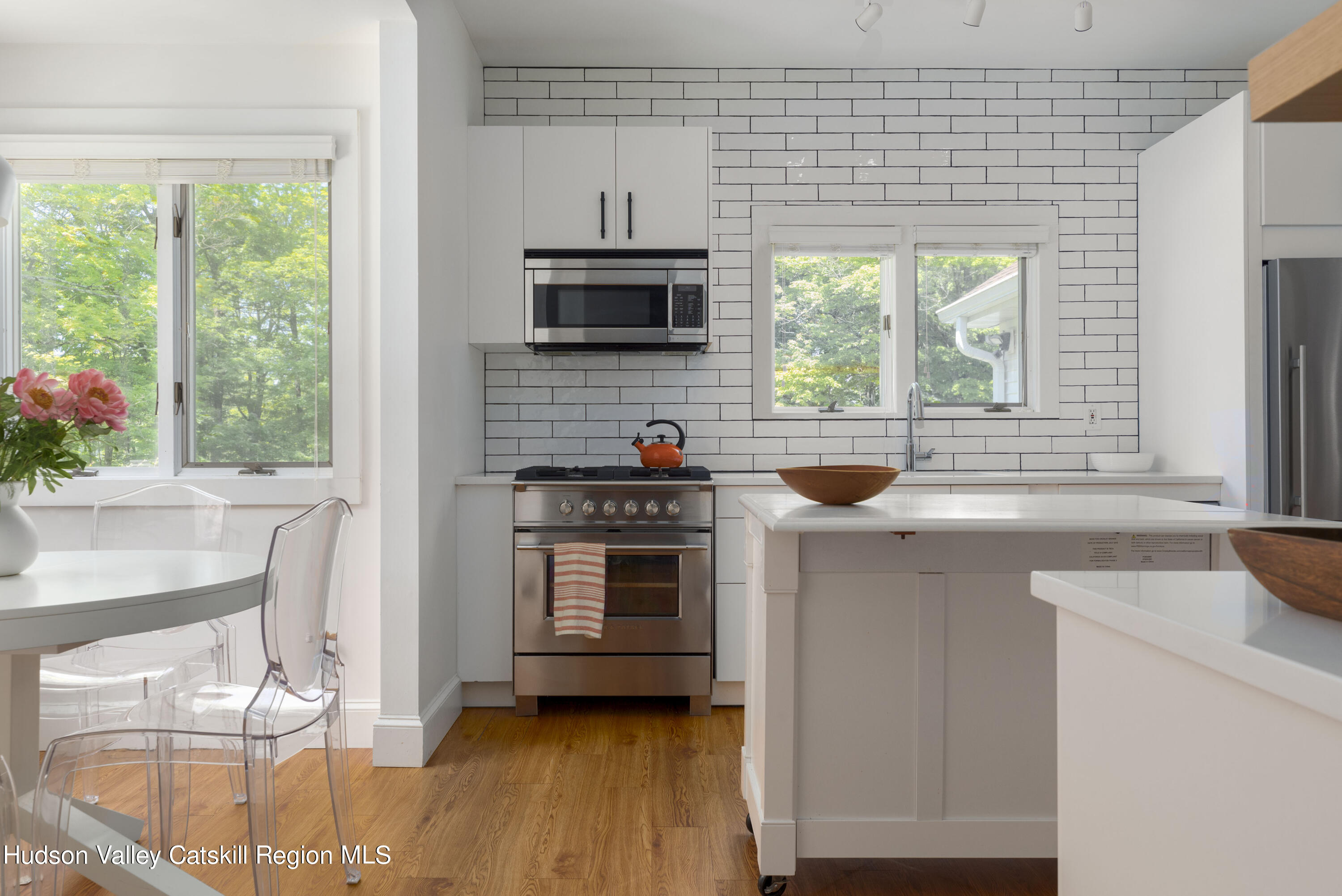 12 Church Hill Road Rifton, NY 12471 - Photo 5 of 33 a kitchen with stainless steel appliances a stove a sink and a microwave