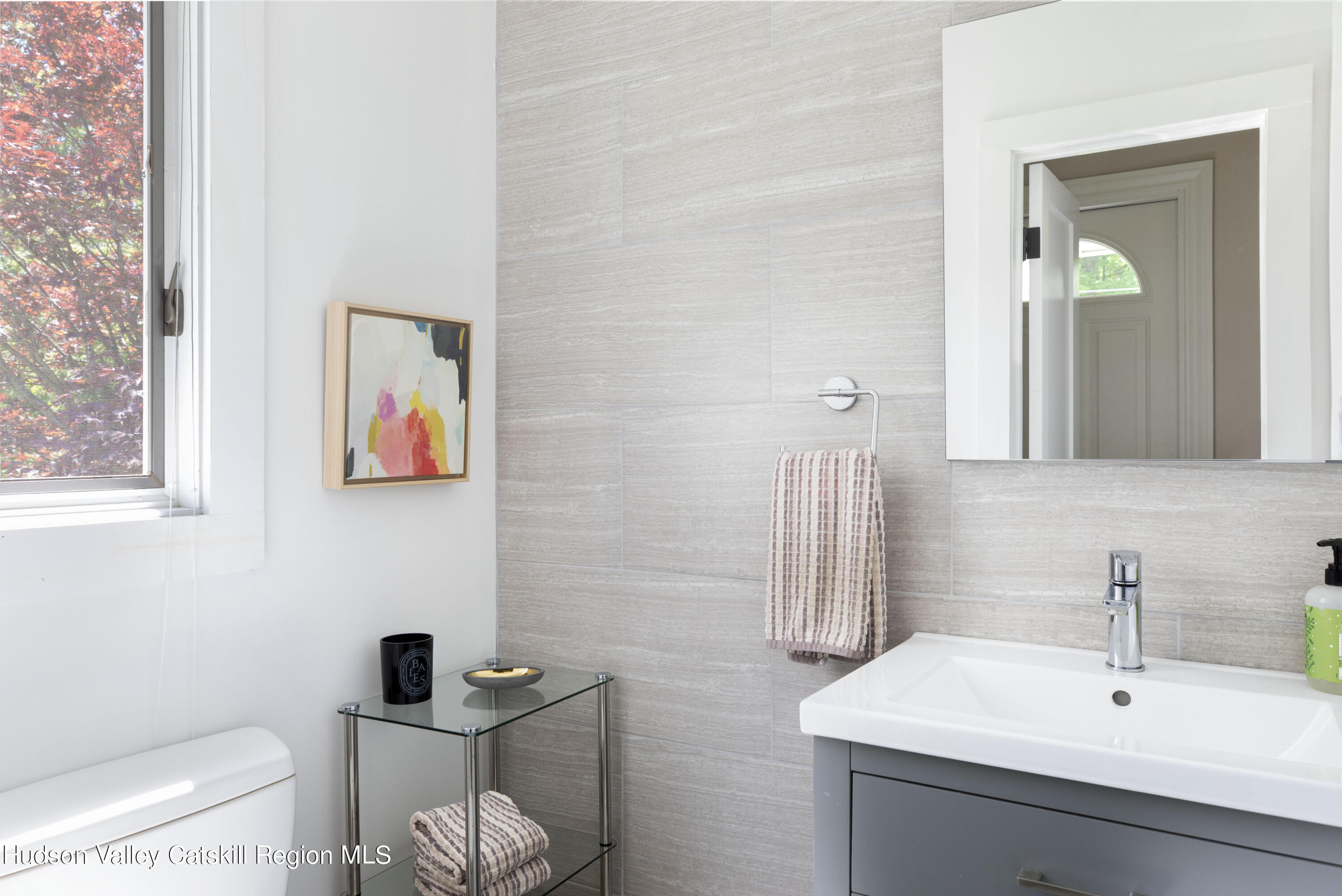 12 Church Hill Road Rifton, NY 12471 - Photo 7 of 33 a bathroom with a toilet sink and mirror