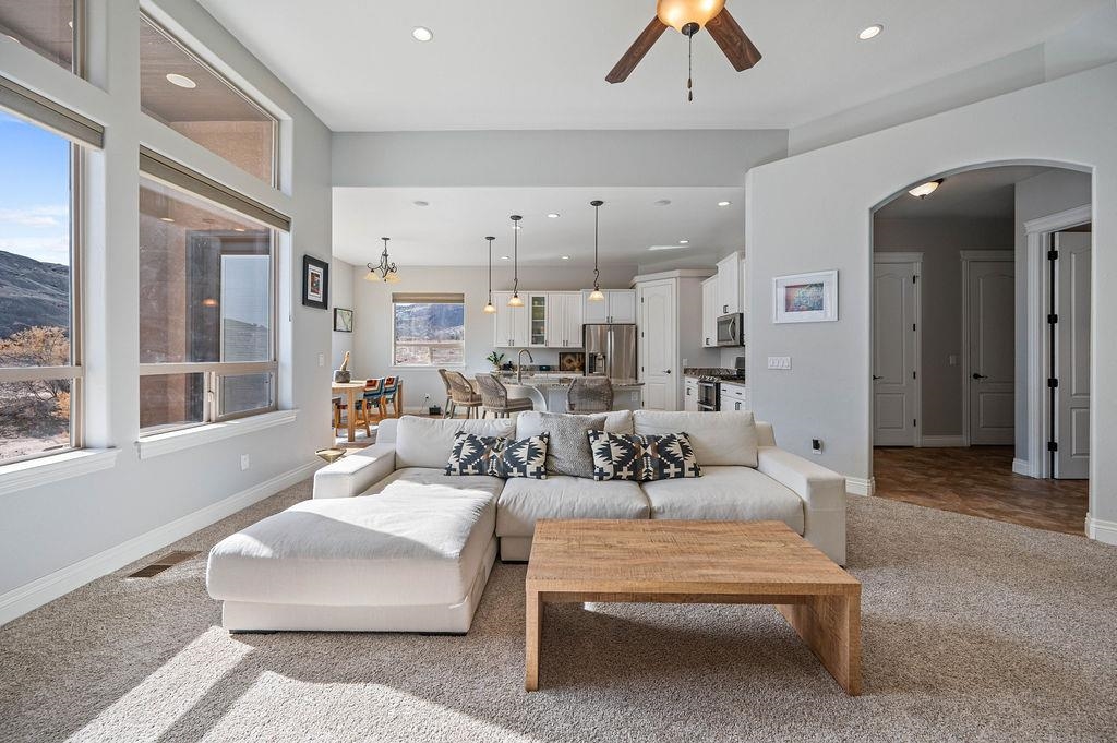 2283 Trail Ridge Road Grand Junction, CO 81507 - Photo 11 of 35 a living room with furniture and a large window