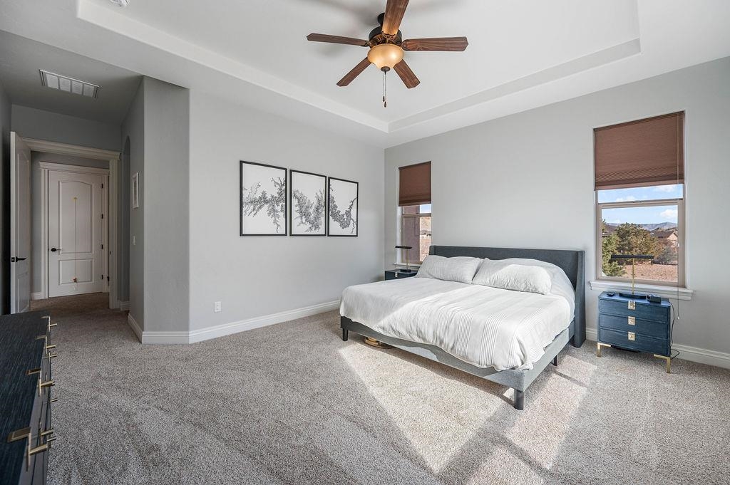 2283 Trail Ridge Road Grand Junction, CO 81507 - Photo 19 of 35 a bedroom with a bed and window