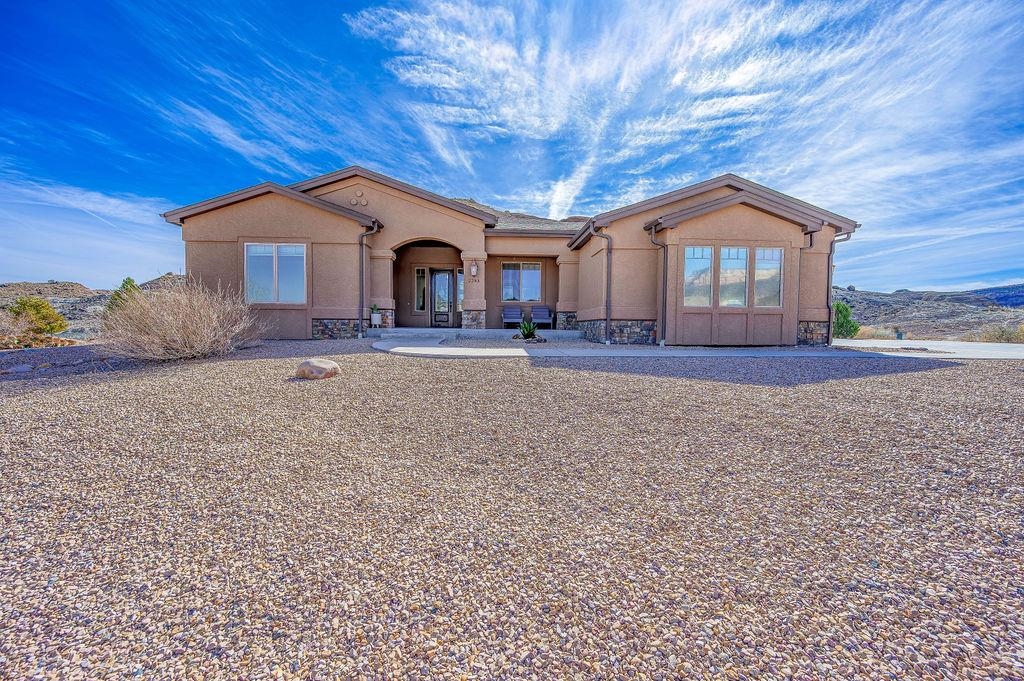 2283 Trail Ridge Road Grand Junction, CO 81507 - Photo 2 of 35 a front view of a house with a yard