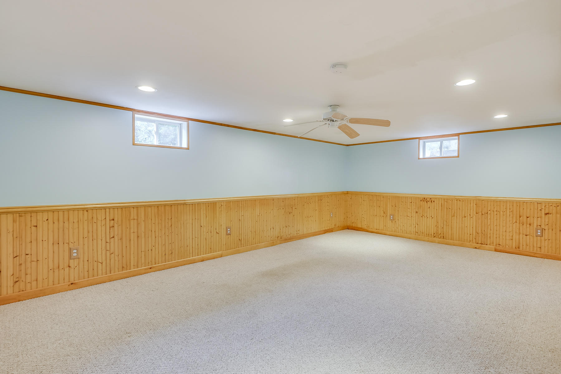 16 Florence Street Monument Beach, MA 02532 - Photo 20 of 35 an empty room with a projector and painted walls