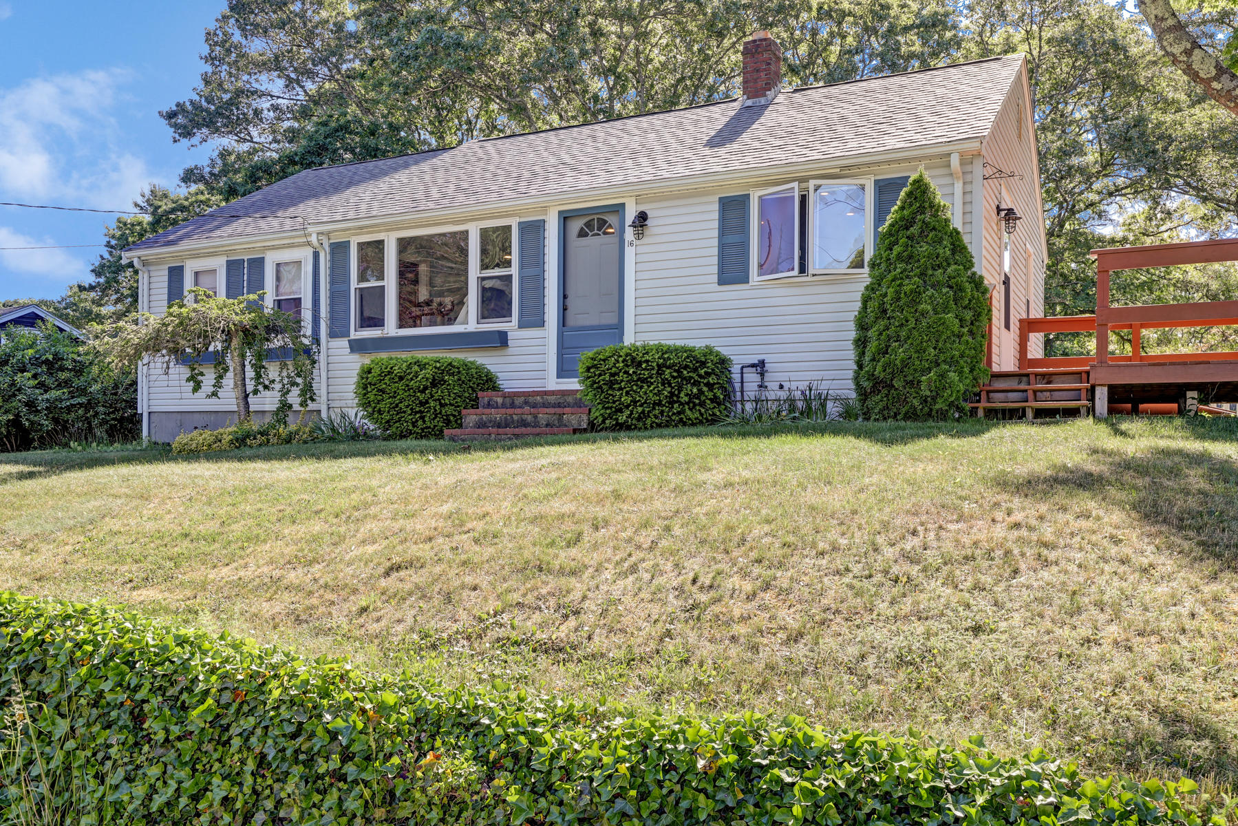 16 Florence Street Monument Beach, MA 02532 - Photo 2 of 35 front view of a house with a yard