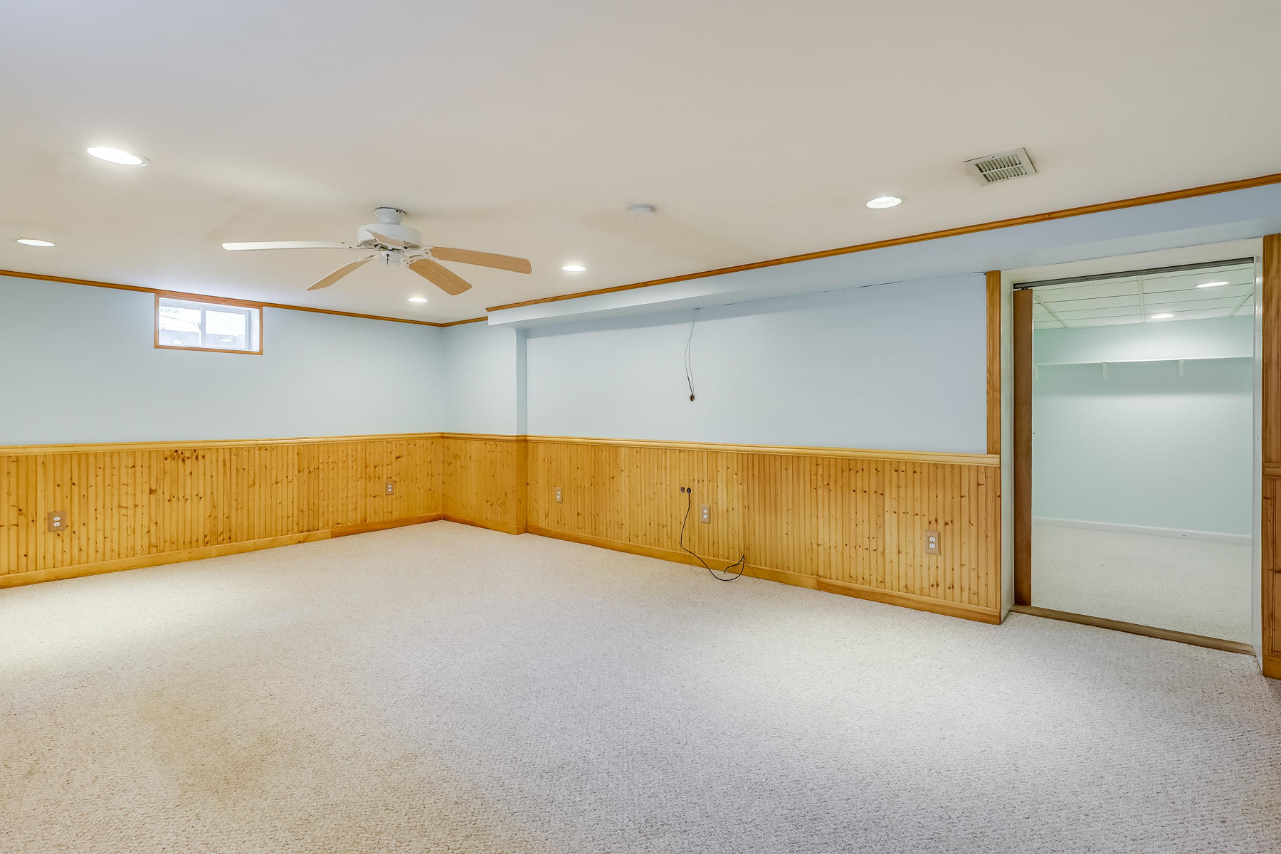 16 Florence Street Monument Beach, MA 02532 - Photo 21 of 35 an empty room with a projector