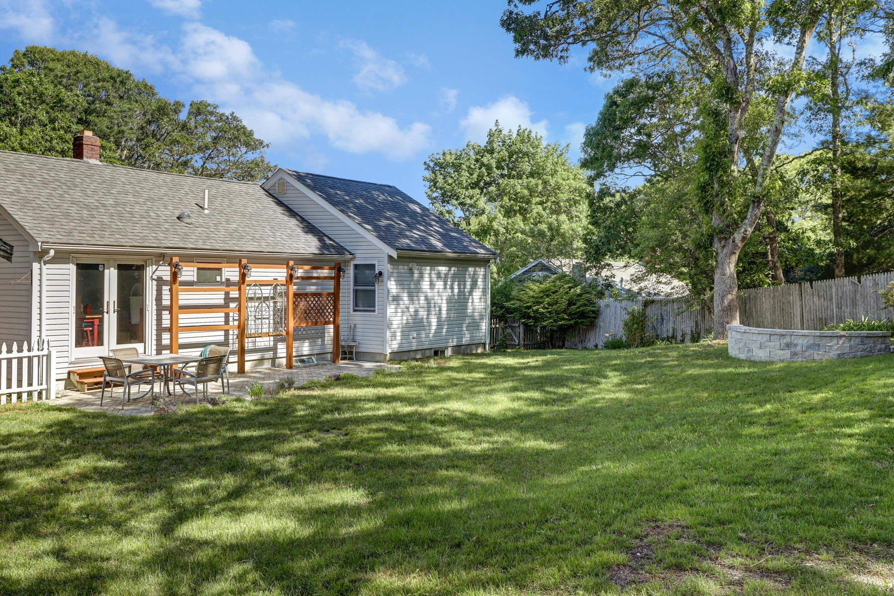 16 Florence Street Monument Beach, MA 02532 - Photo 28 of 35 a front view of a house with a garden