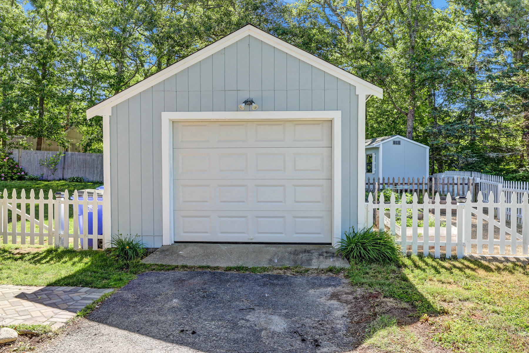 16 Florence Street Monument Beach, MA 02532 - Photo 32 of 35 a front view of house with yard and trees in the background