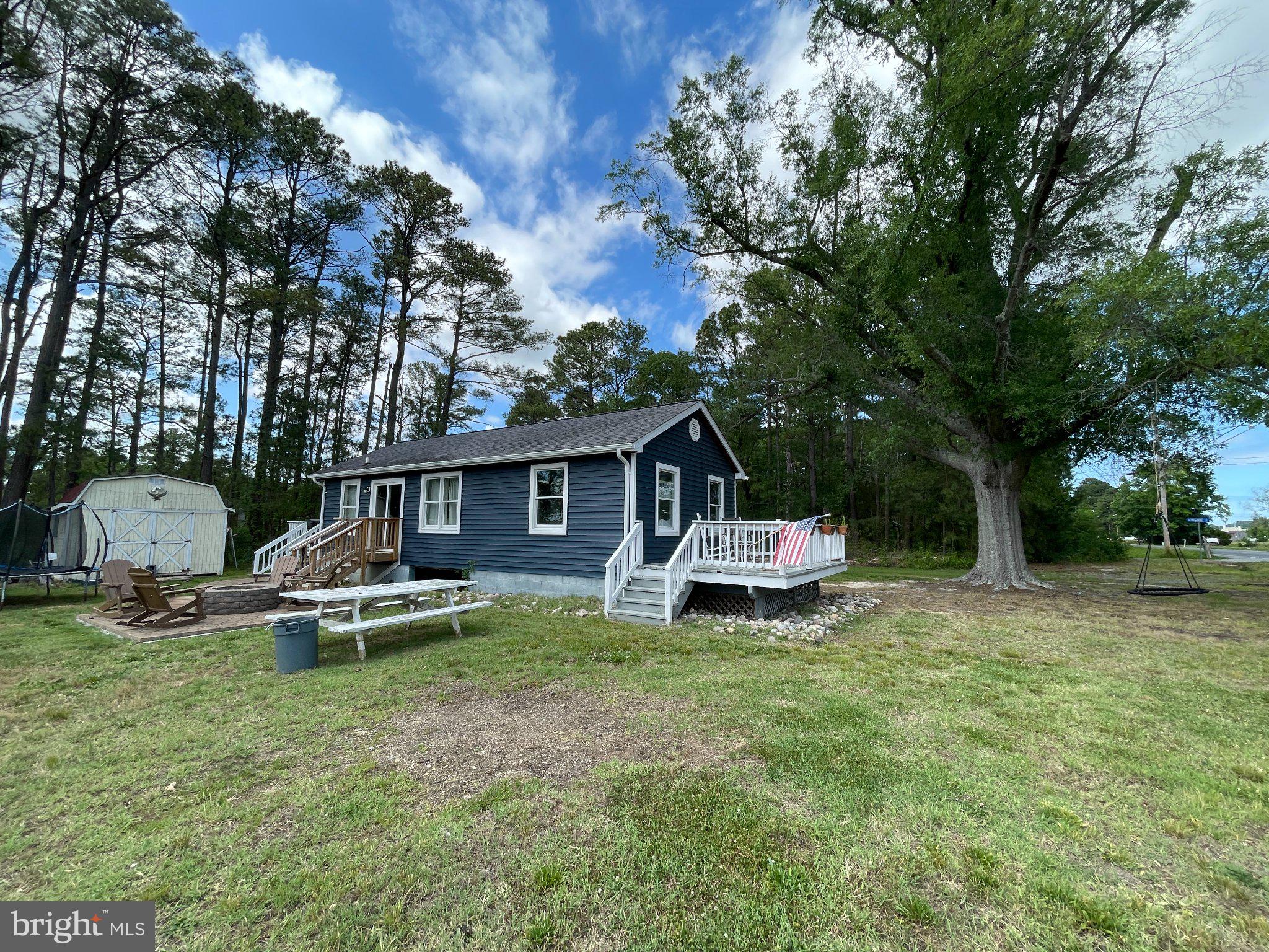 8841 Broomes Island Road Broomes Island, MD 20615 - Photo 18 of 20 Charming blue cottage by the woods.