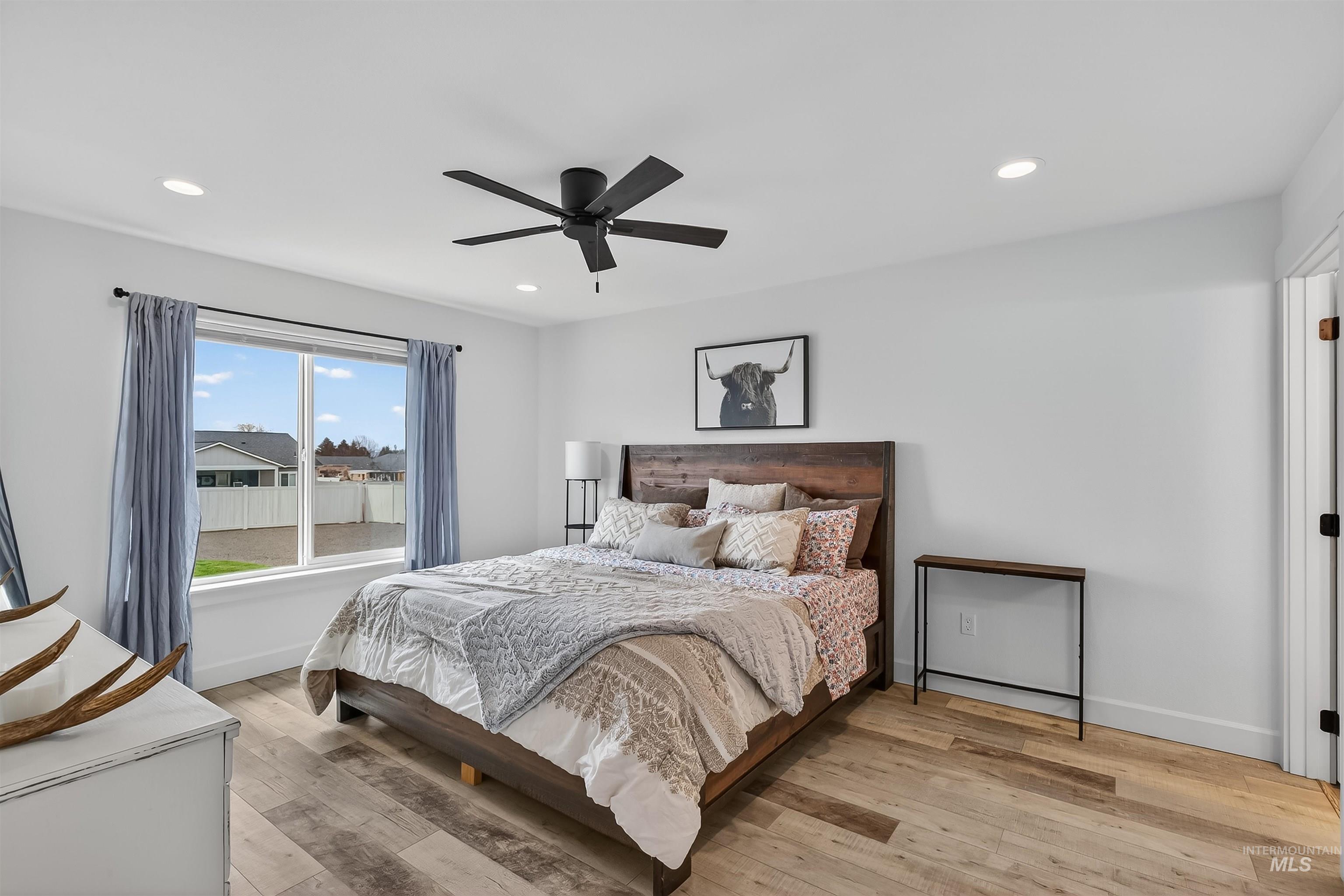 3732 Skyview Drive Lewiston, ID 83501 - Photo 24 of 47 Bedroom featuring light wood-style flooring, a ceiling fan, and recessed lighting