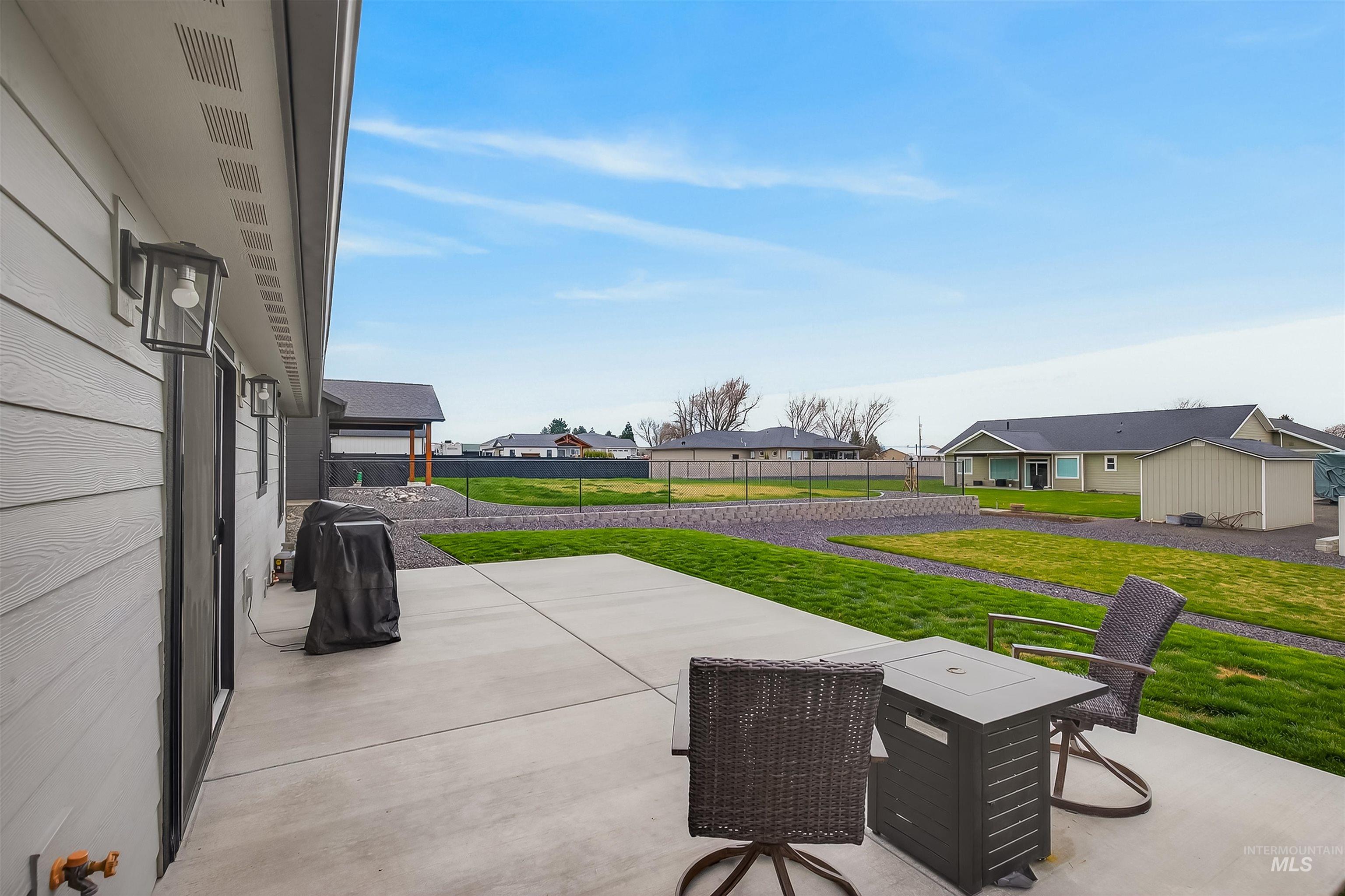 3732 Skyview Drive Lewiston, ID 83501 - Photo 36 of 47 Fenced backyard featuring a patio and a residential view