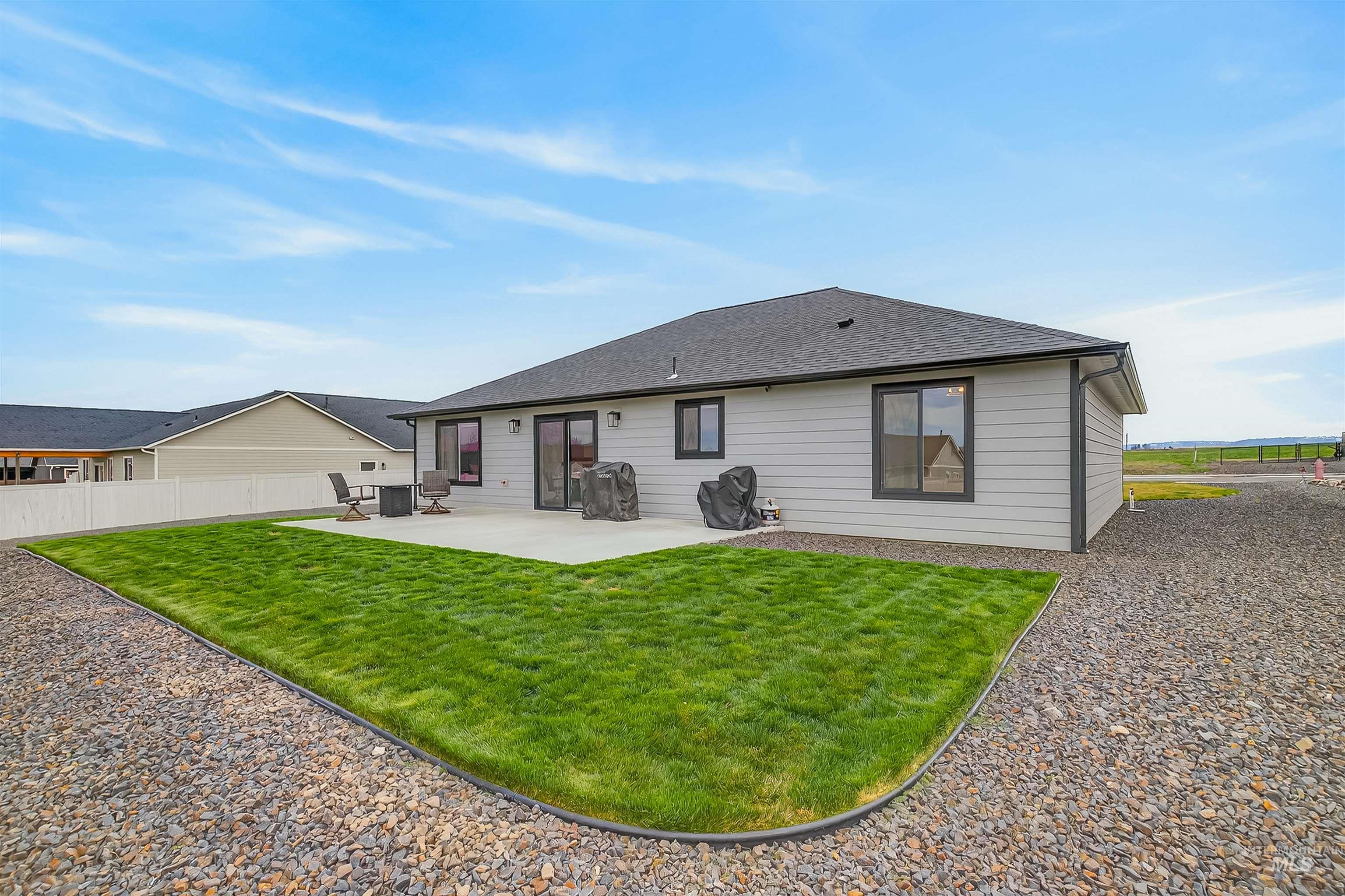 3732 Skyview Drive Lewiston, ID 83501 - Photo 38 of 47 Back of house featuring a patio area and roof with shingles