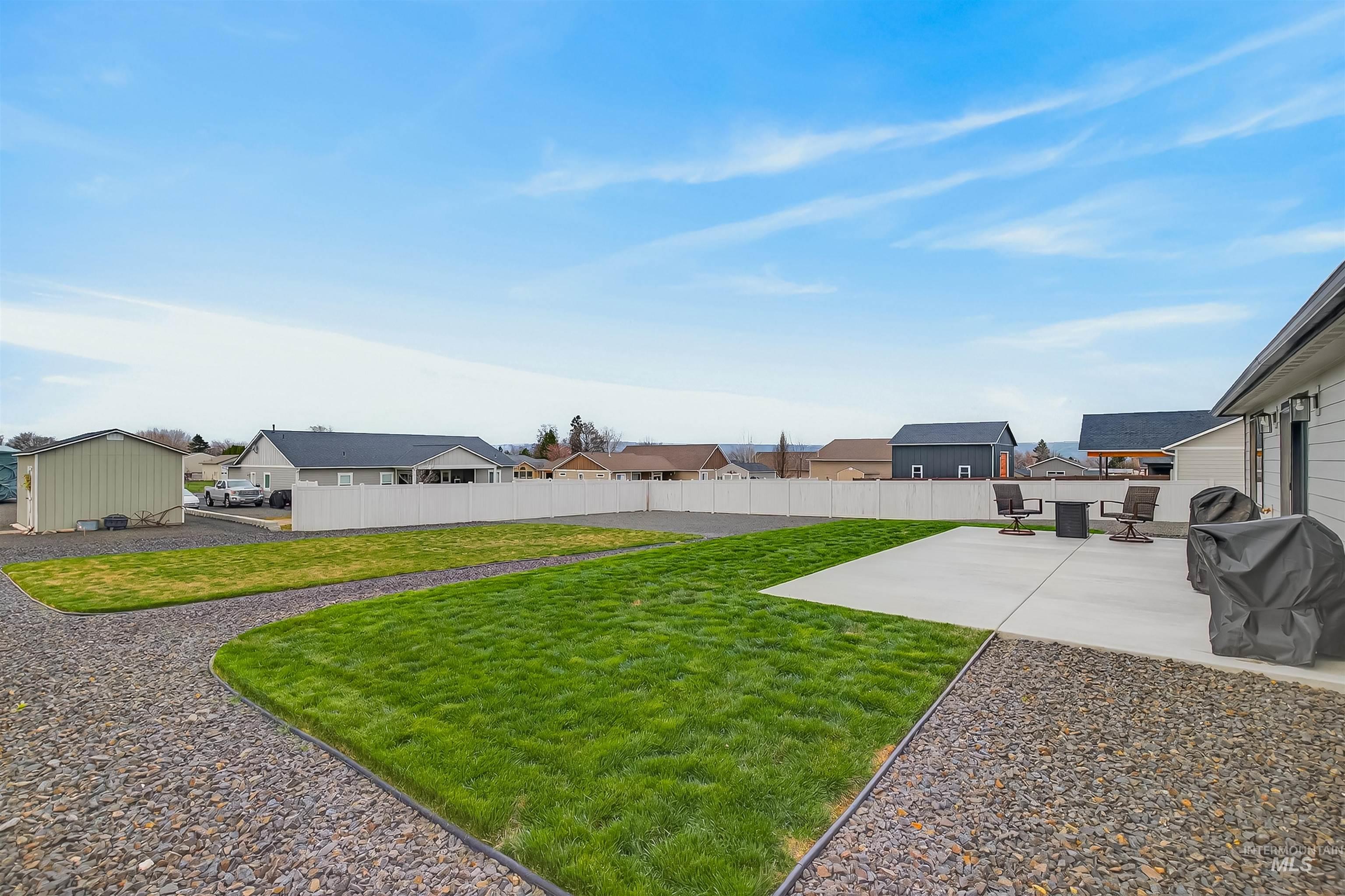3732 Skyview Drive Lewiston, ID 83501 - Photo 39 of 47 Fenced backyard with a residential view and a patio
