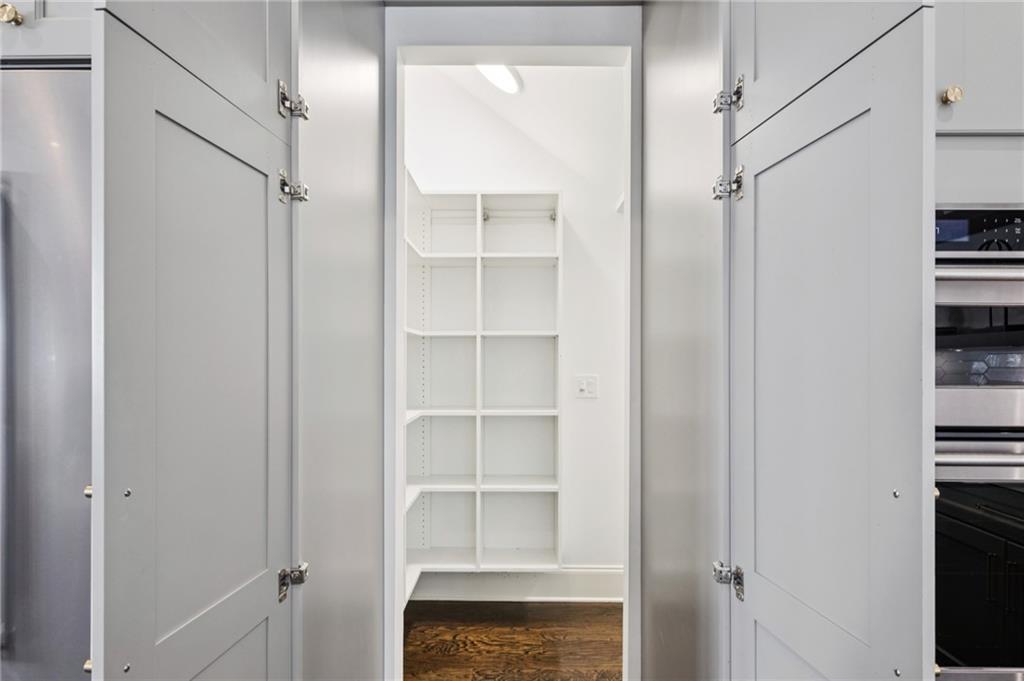 216 Haralson Lane Atlanta, GA 30307 - Photo 16 of 48 a view of walk in closet with empty racks
