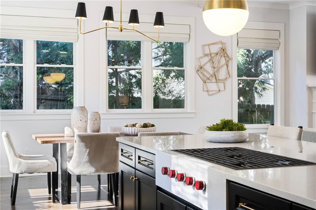 216 Haralson Lane Atlanta, GA 30307 - Photo 18 of 48 a kitchen that has a table and chairs in it