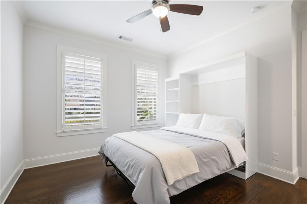 216 Haralson Lane Atlanta, GA 30307 - Photo 23 of 48 a bedroom with a bed and a window